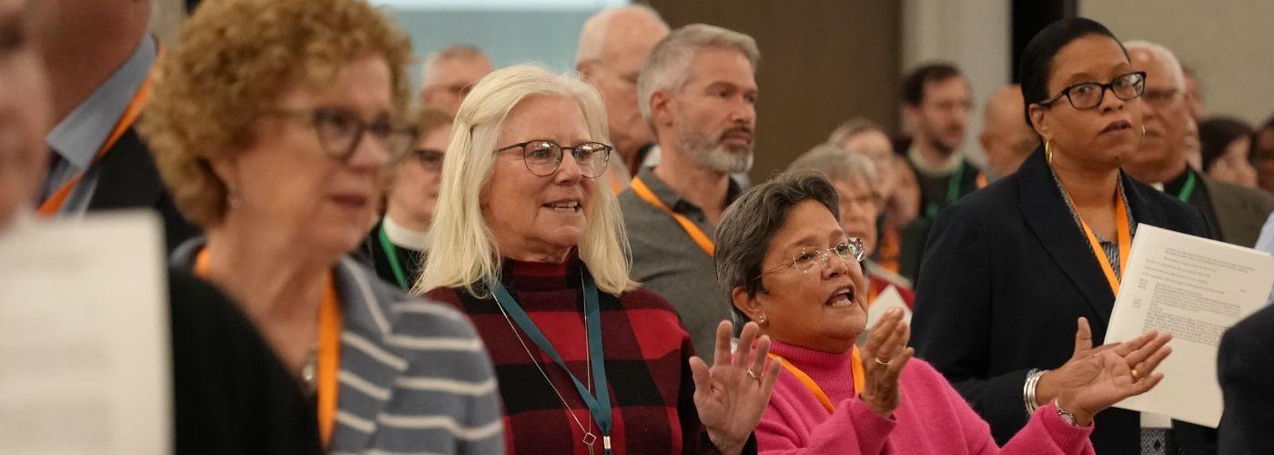 Delegates at Convention worshipping during Convention Liturgy