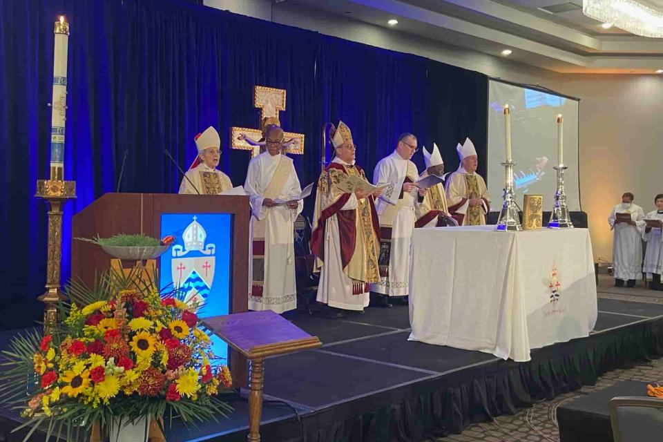 Clergy standing on stage at the 156th Convention of the Diocese of Long Island