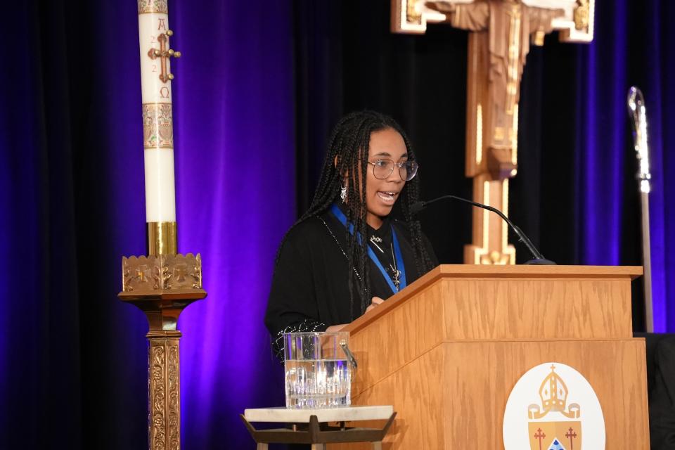 Ms. Arianne Radix preaches the homily at evening prayer of the 158th Convention